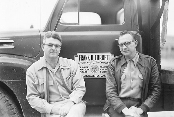 Frank D. Corbett.  General Contractor and founder of Television Education, Inc. sitting in front of his work truck.